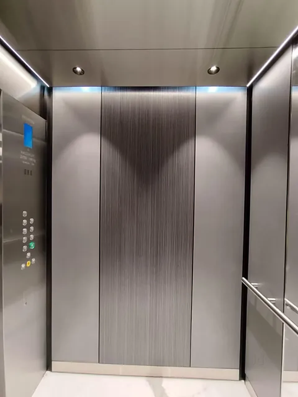 Metal clad elevator interior at Xperia Mall